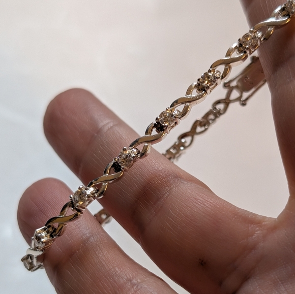 Jewelry - Elegant Sterling Silver 925 Swirl Link Tennis Bracelet Double Safety Clasp